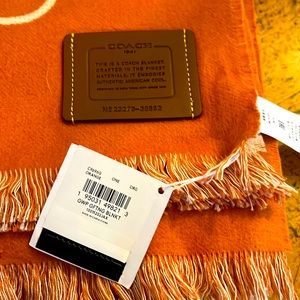 Coach signature reversible blanket scarf.